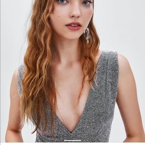 Zara silver metallic body suit.